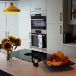 Modern kitchen with orange accents