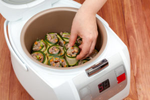Multicooker filled with vegetable rolls